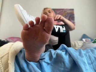 Giantess in black leggins sniffing her smelly trainers after long walking