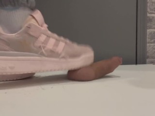 trampling in pink sneakers