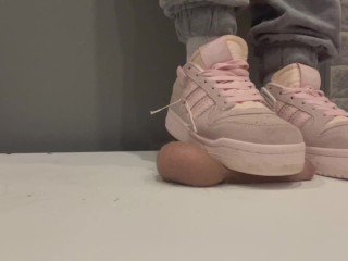 trampling in pink sneakers