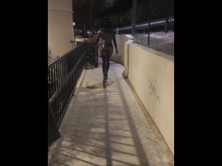 Tania walking latex in public