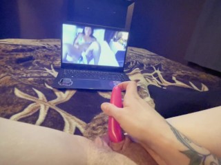 Petite girl gets off watching porn with a vibrator