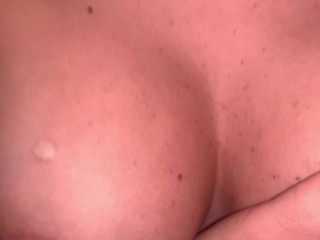 Horny blonde doing a handjob while I enjoy watching his perfect big boobs