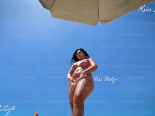 Sunny day, doing what I love most: Showing off in my micro bikinis on the beach. pussy keeps jumping