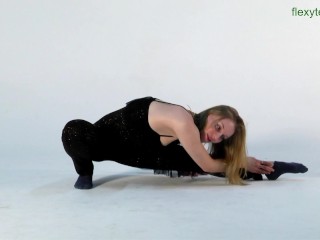 Sofya Belaya staggers with elegant stretching in the video