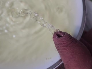 Pissing on a plate and spilled on my bedsheet