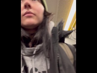 Girl edges on public train