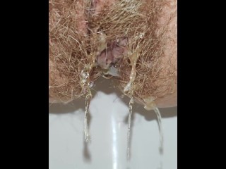 Hairy pussy pissing in the office toilet after quick sex with creampie