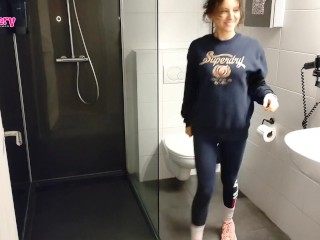 Pissing college girl in leggings