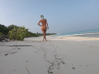 Nudist walk on the Ocean beach