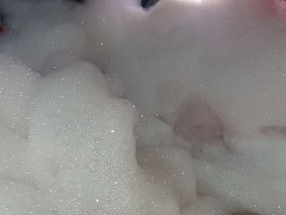 new girlfriend in the tub full of foam, all sexy and naughty, dancing sexy in the motel