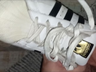 Sniffing her sweaty sneakers and cumming on her soles