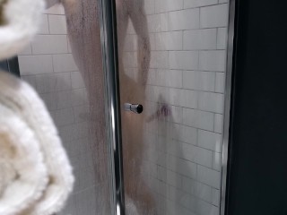 Toned Twink caught having fun in the shower so teases the camera ["Some shower fun"]