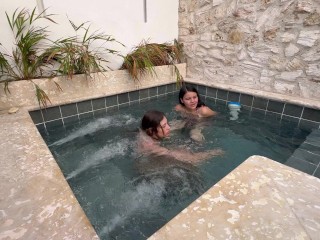 Two hot lesbians masturbate in a public pool, afraid of being discovered.