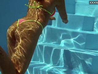 French model enjoys herself underwater