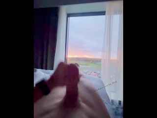 Wanking in front of the window at large hotel. Hope someone sees me ;) full video to cum soon