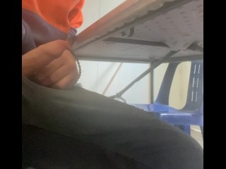 Jerking off under the desk at work and cumming on the floor