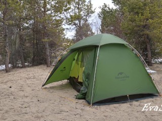 A gorgeous blonde without panties is assembling a tent. For lovers of peeping