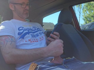 Stroking / jacking / jerking  my cock to porn in a public car park