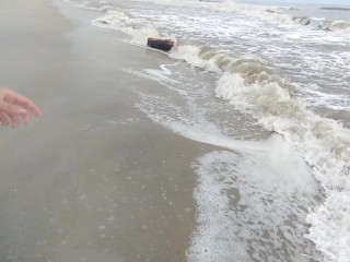 On the beach an unknown girl sucks my cock. IN PUBLIC