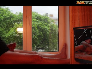 Masturbating by the window while watching porn with hot anal