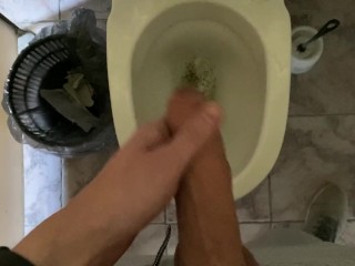 Long pissing of an uncircumcised penis in a public toilet POV