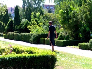 Submissive woman appears nude in public park, masturbation and peeing