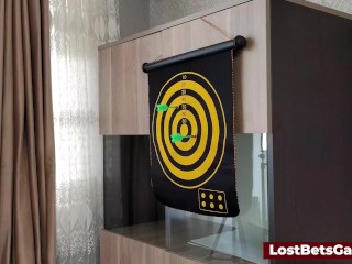 Hot Redhead plays darts with her game and loses the bet