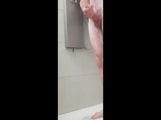 Jerking off while taking a shower