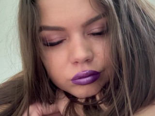 Close-up Face Expression Farts with purple lipstick