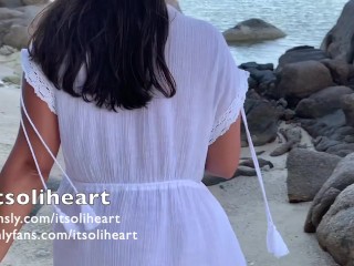 PUBLIC BEACH - naked young woman applying suncream