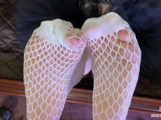 The Goddess in white fishnet tights teasing you with her sexy feet and ass