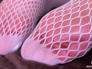 The Goddess in white fishnet tights teasing you with her sexy feet and ass
