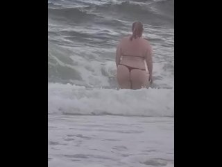 Big booty blonde playing on the beach