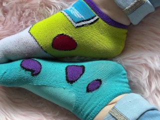 Mismatched socks and cute feet