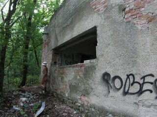 Naked girl came to an abandoned building in the forest