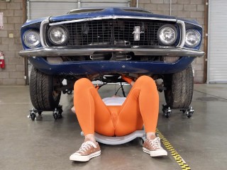 Girl with Wet Camel Toe looks under a Car