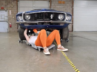 Girl with Wet Camel Toe looks under a Car