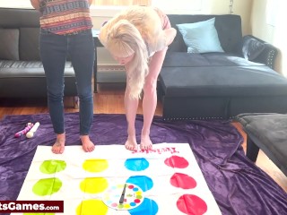 Strip twister in the living room involving horny lesbians