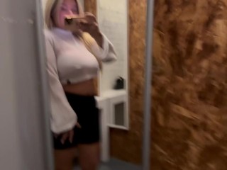 SEXY MILF TRIES ON TRANSPARENT TOPS IN A FITTINGROOM