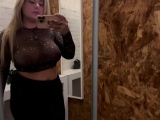 SEXY MILF TRIES ON TRANSPARENT TOPS IN A FITTINGROOM