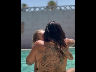 Sexy lesbian makeout with back tattoo visible