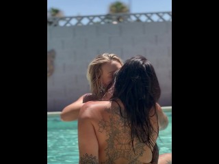 Sexy lesbian makeout with back tattoo visible