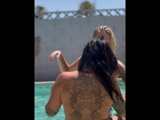 Sexy lesbian makeout with back tattoo visible