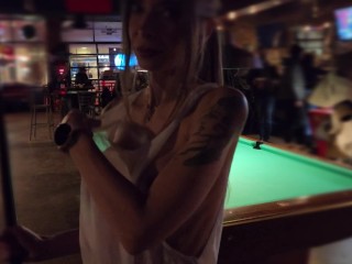 Braless tits and pussy exposed at the pool hall!