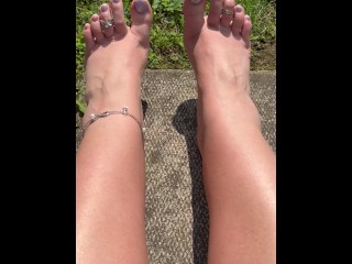 Enjoying the sunshine on my legs and feet