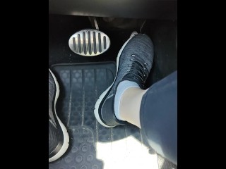 Revving my car with my sketchers sneakers