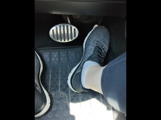 Revving my car with my sketchers sneakers