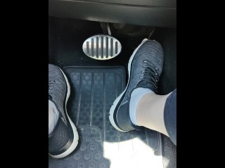 Revving my car with my sketchers sneakers