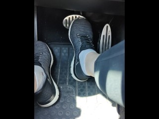 Revving my car with my sketchers sneakers