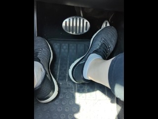 Revving my car with my sketchers sneakers